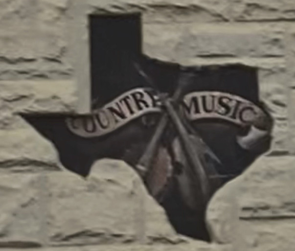 Music Friendly Vidor highway sign at sunset